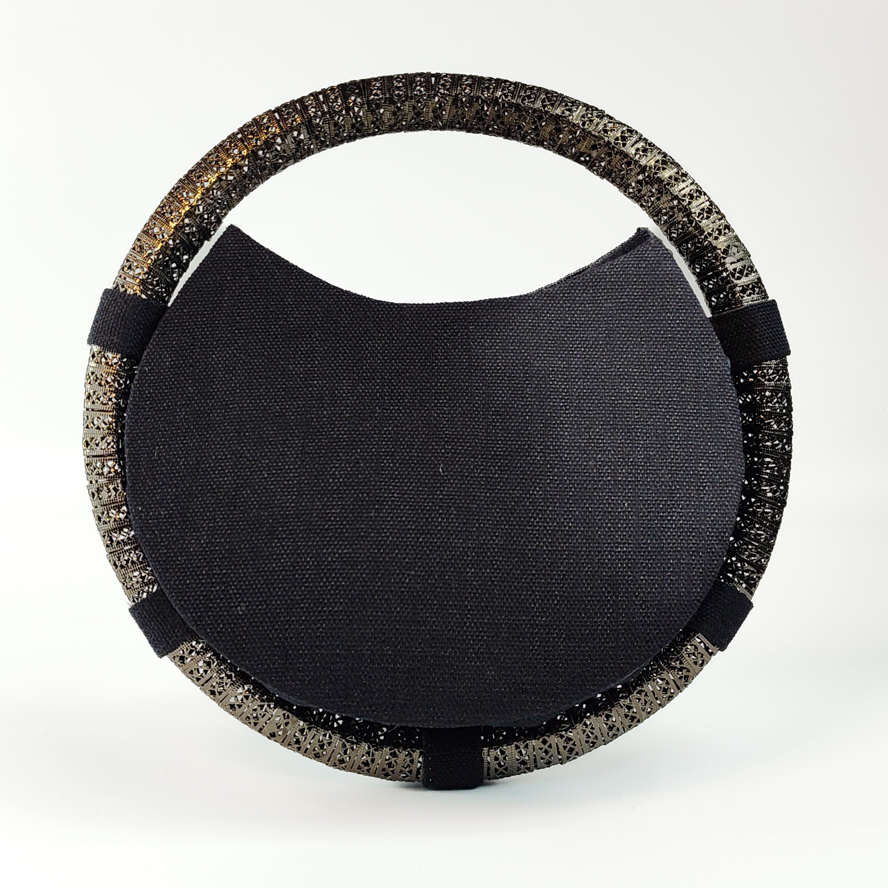 The Gilded Onyx Statement Round Clutch