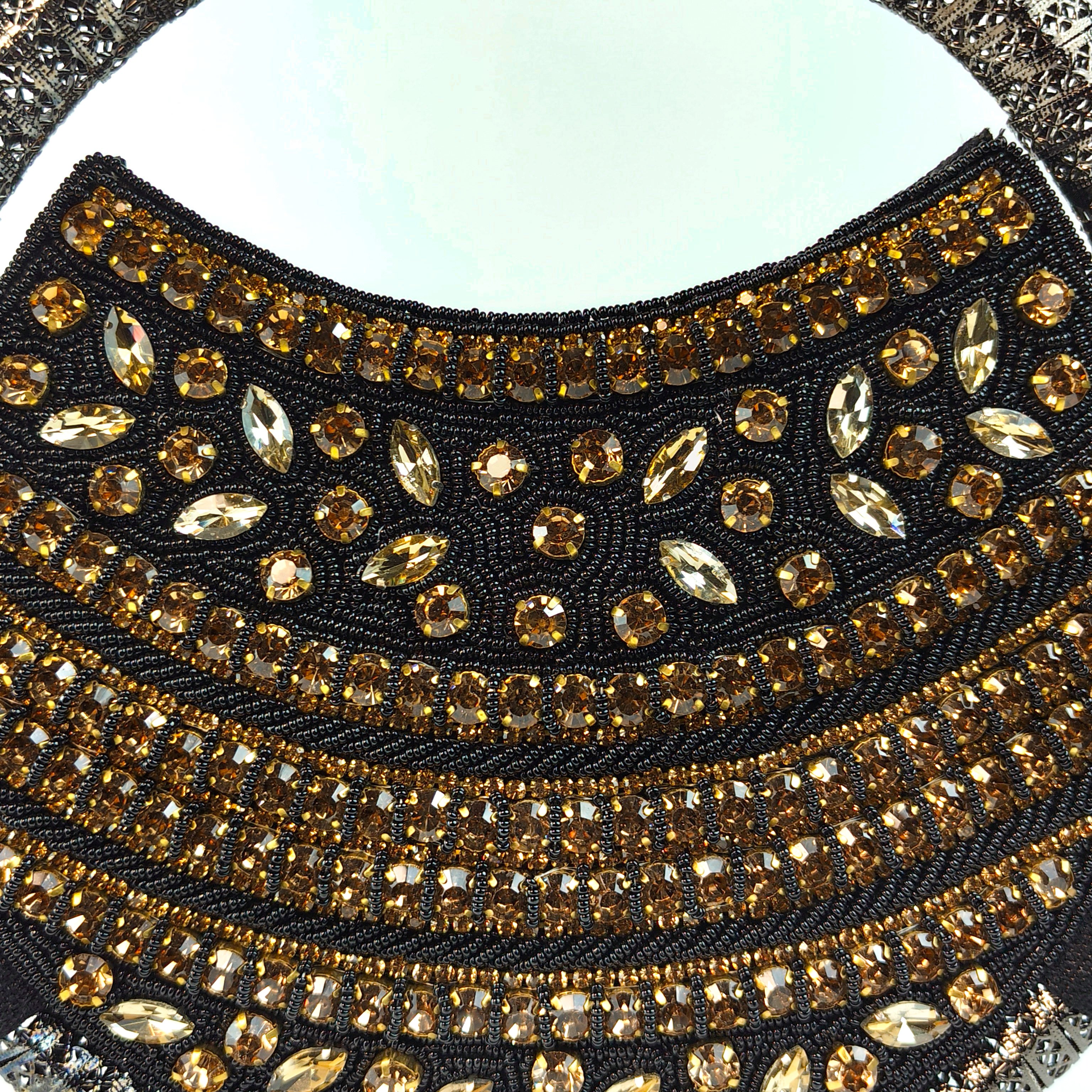 The Gilded Onyx Statement Round Clutch