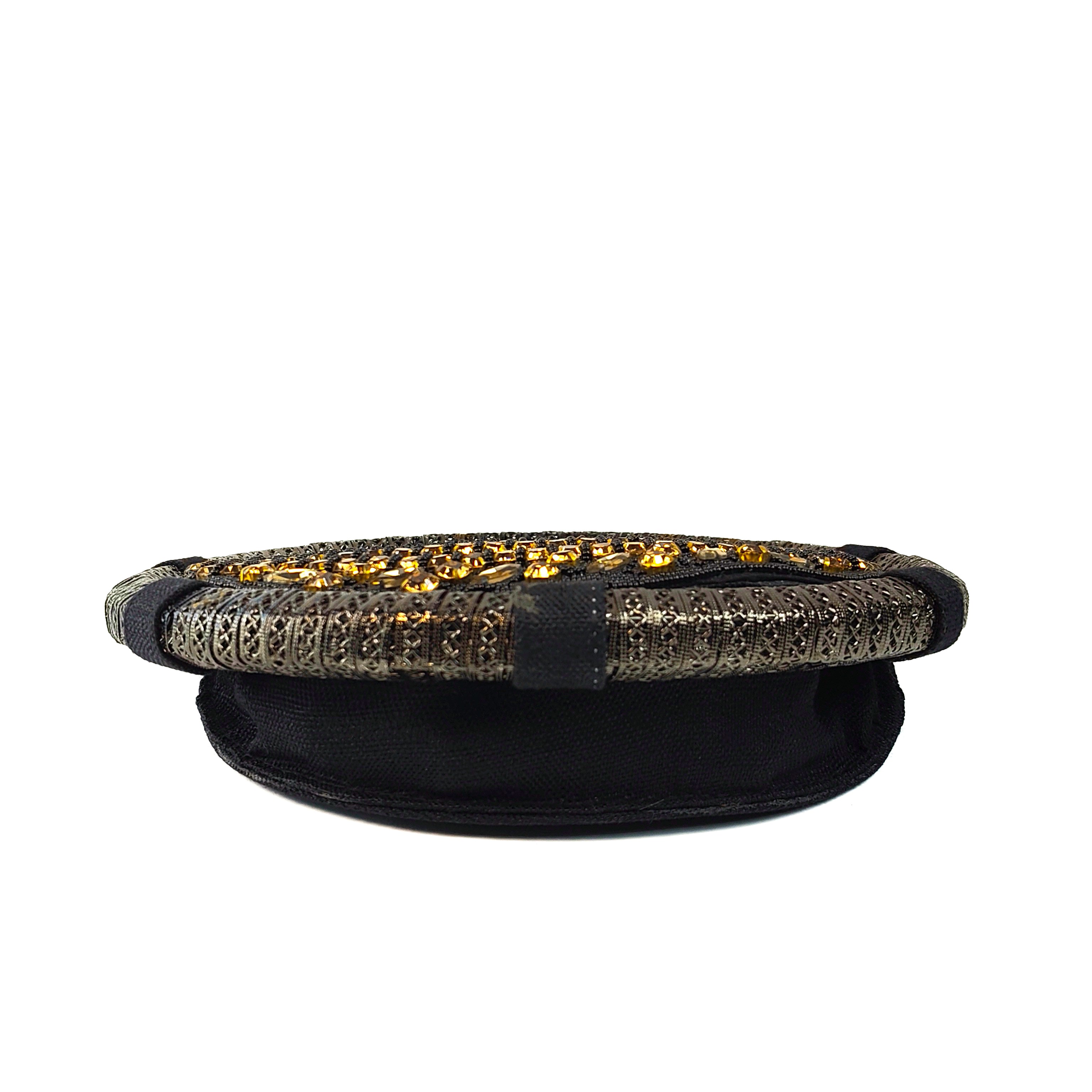 The Gilded Onyx Statement Round Clutch