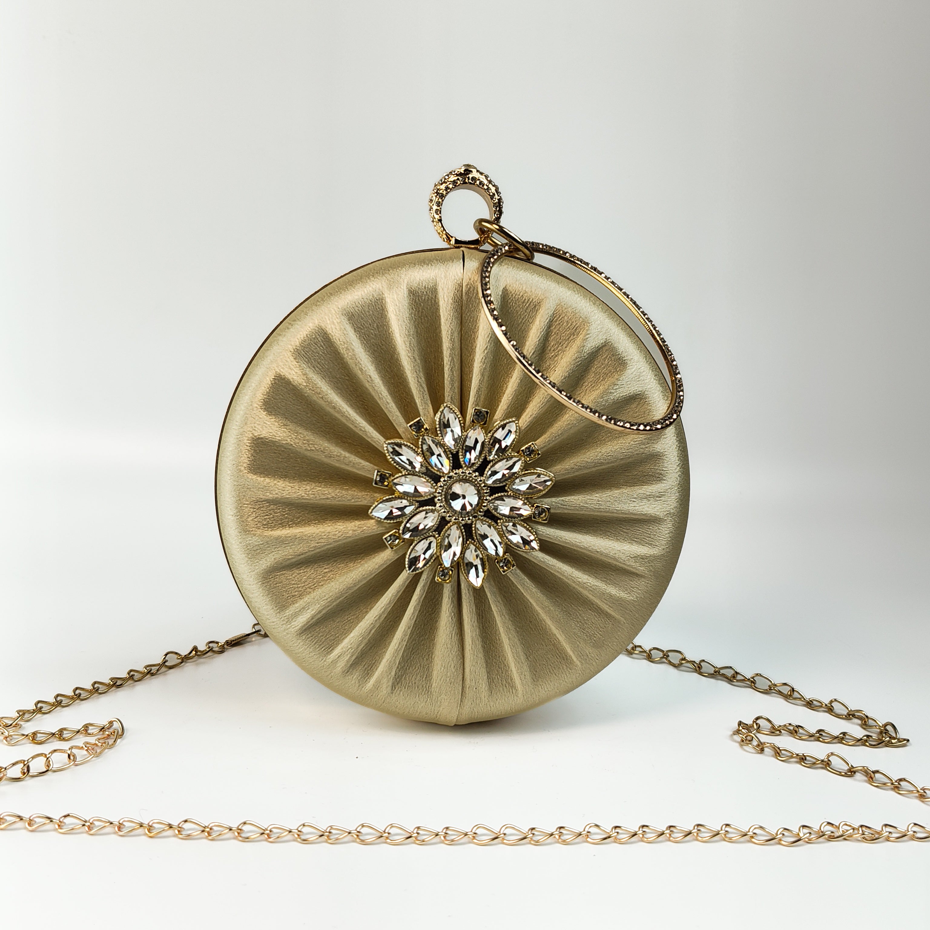 The Gilded Aura Ring Handle Clutch