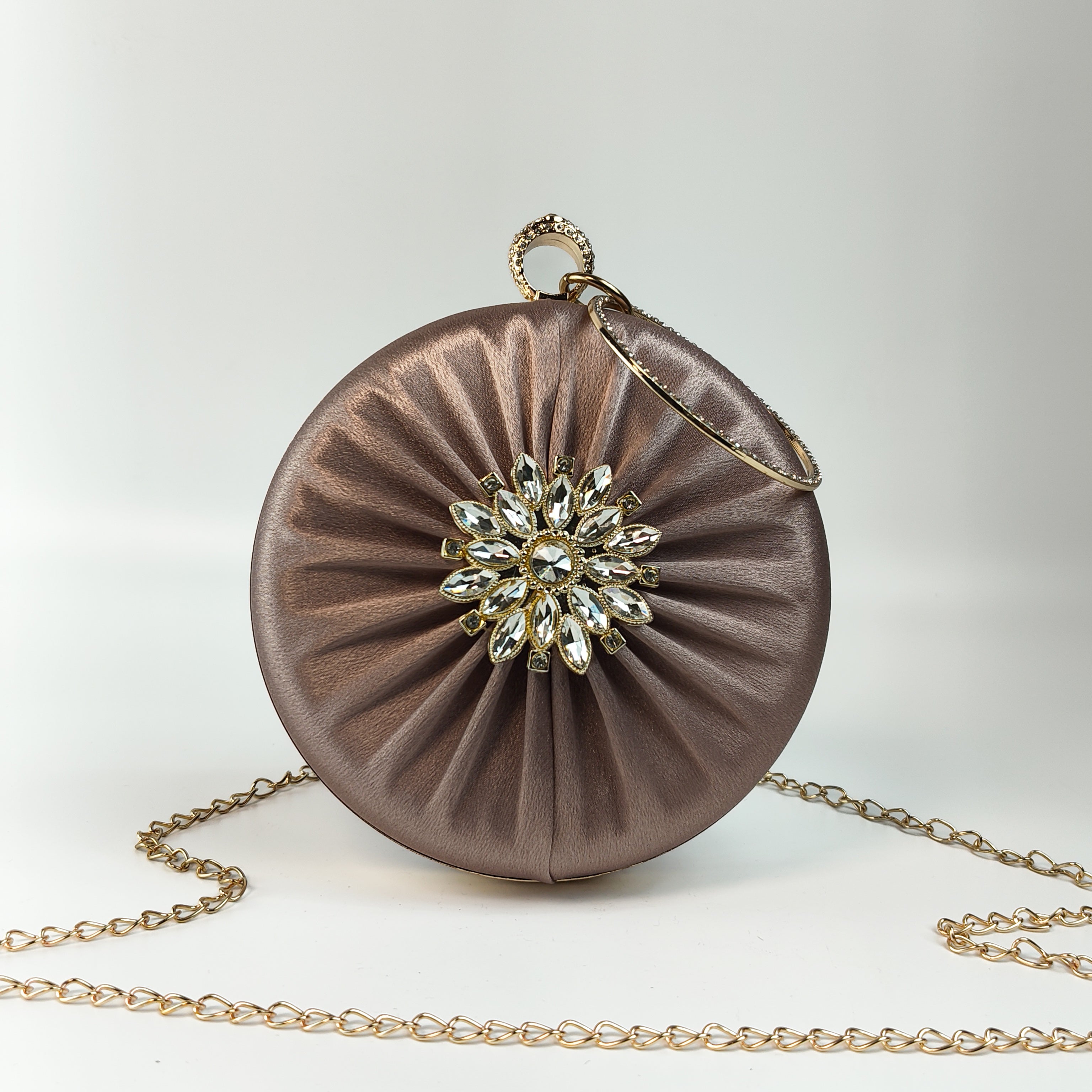 The Bronze Aura Ring Handle Clutch